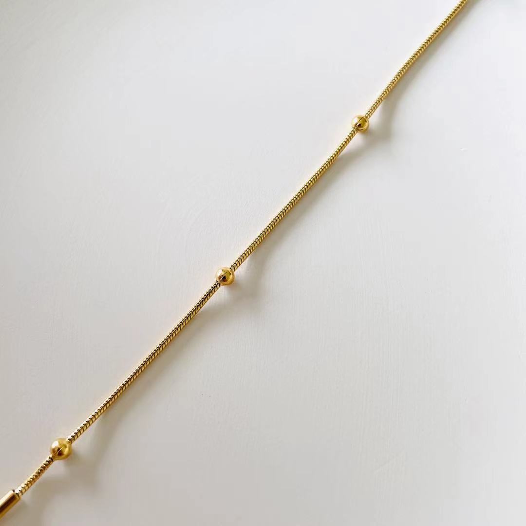 gold stud bracelet