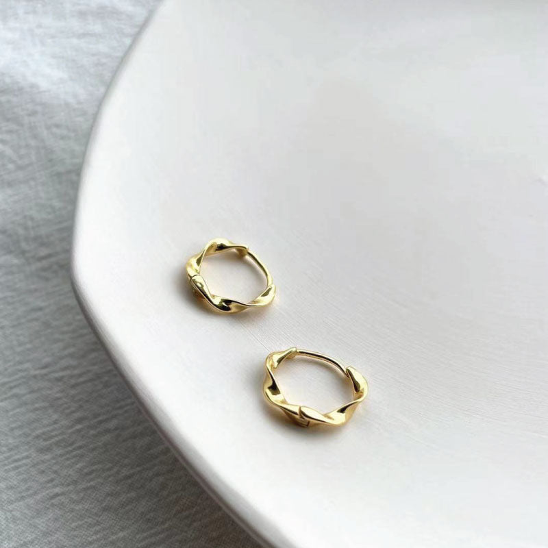 gold twisted hoop earrings