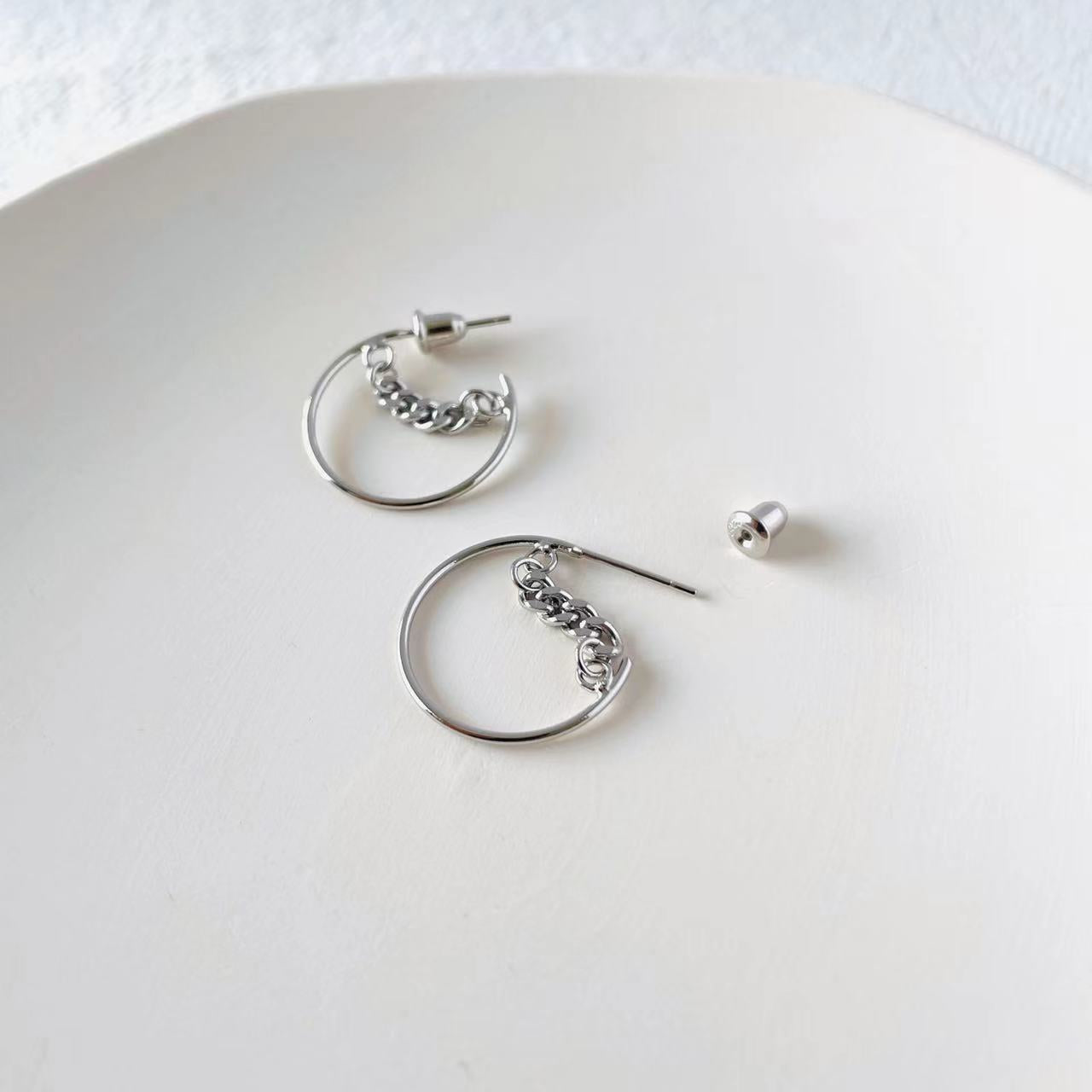 chained silver earrings