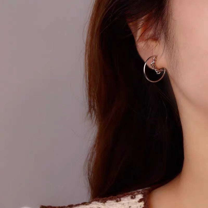 chained silver earrings