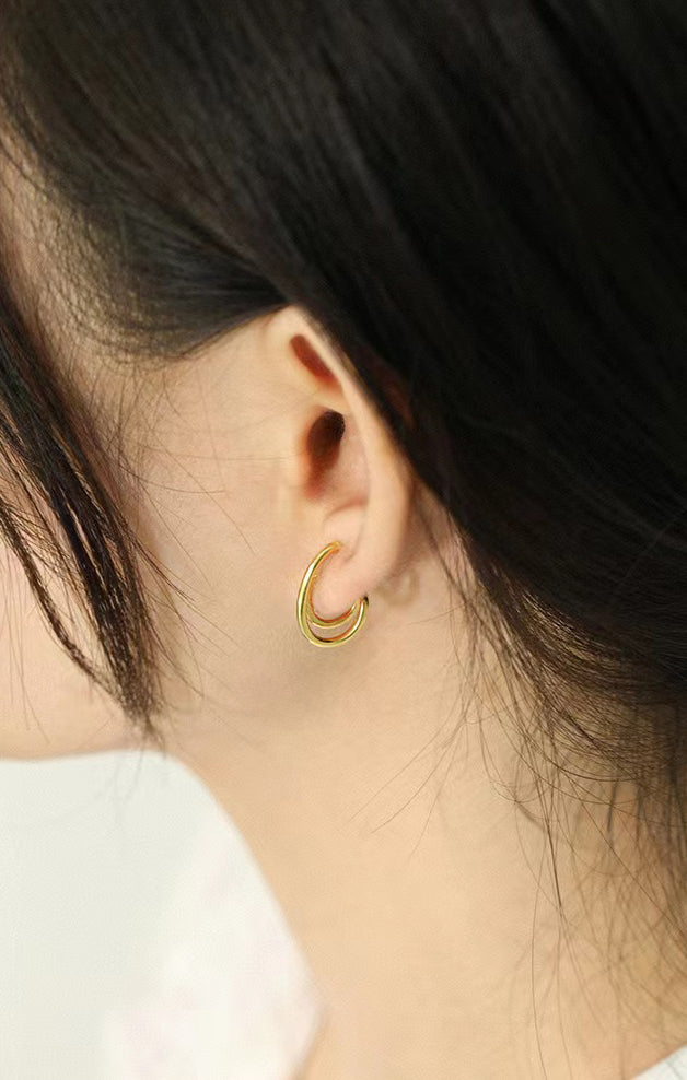 gold curve earrings