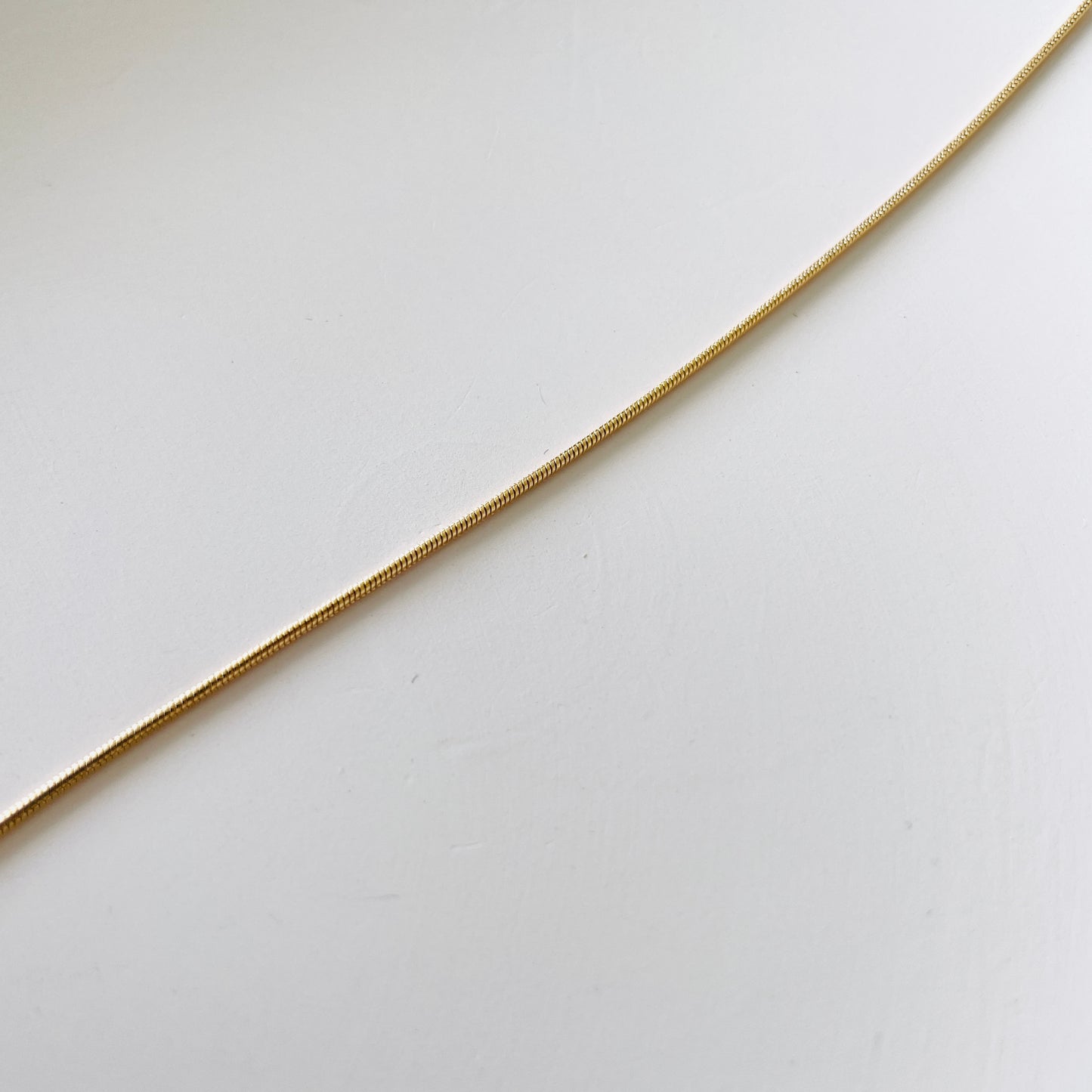 gold delicate snake chain necklace