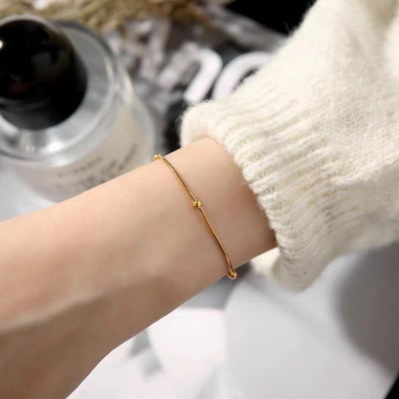 gold stud bracelet