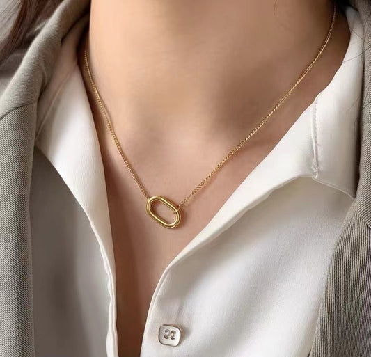 gold geometrical pendant necklace