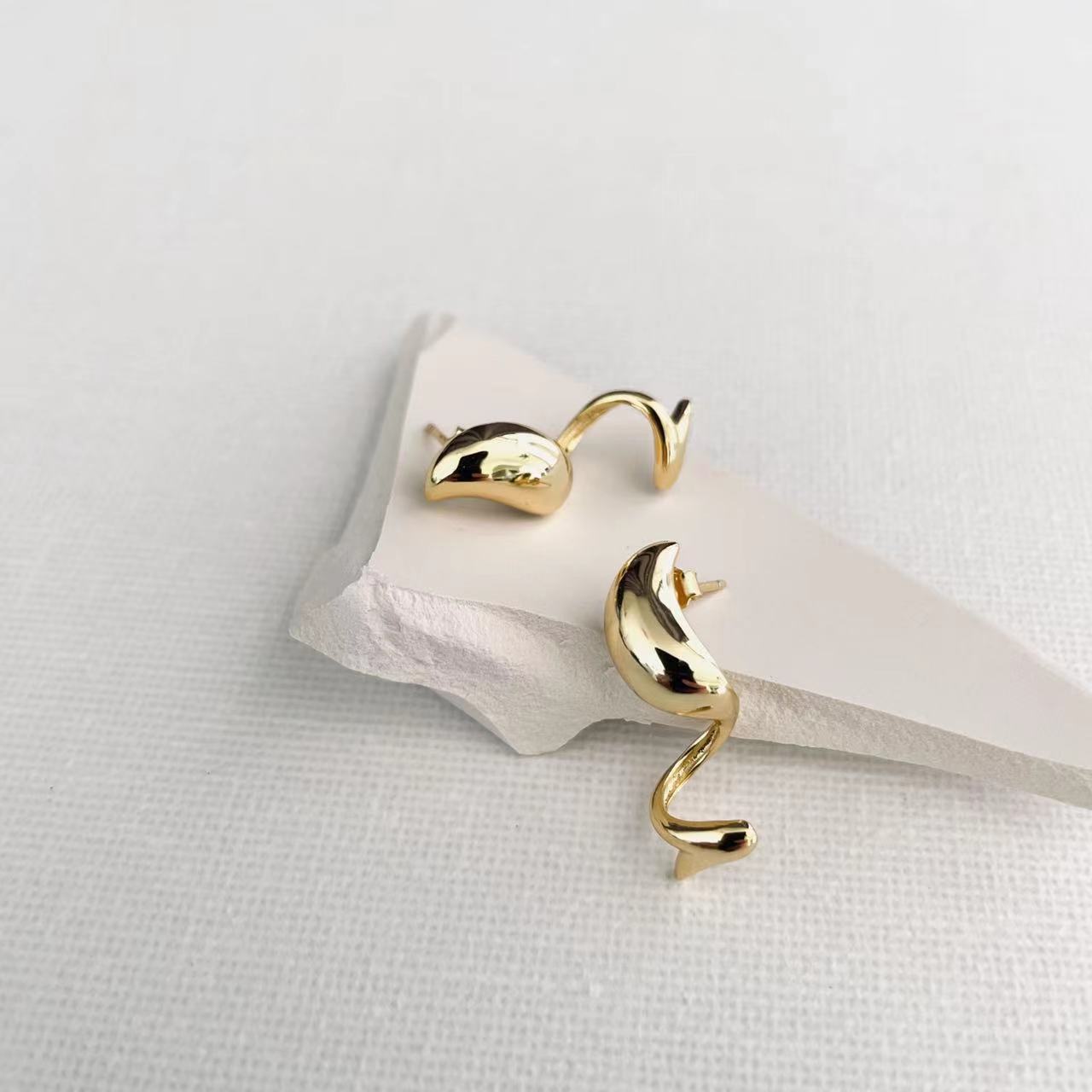 gold twisted earrings