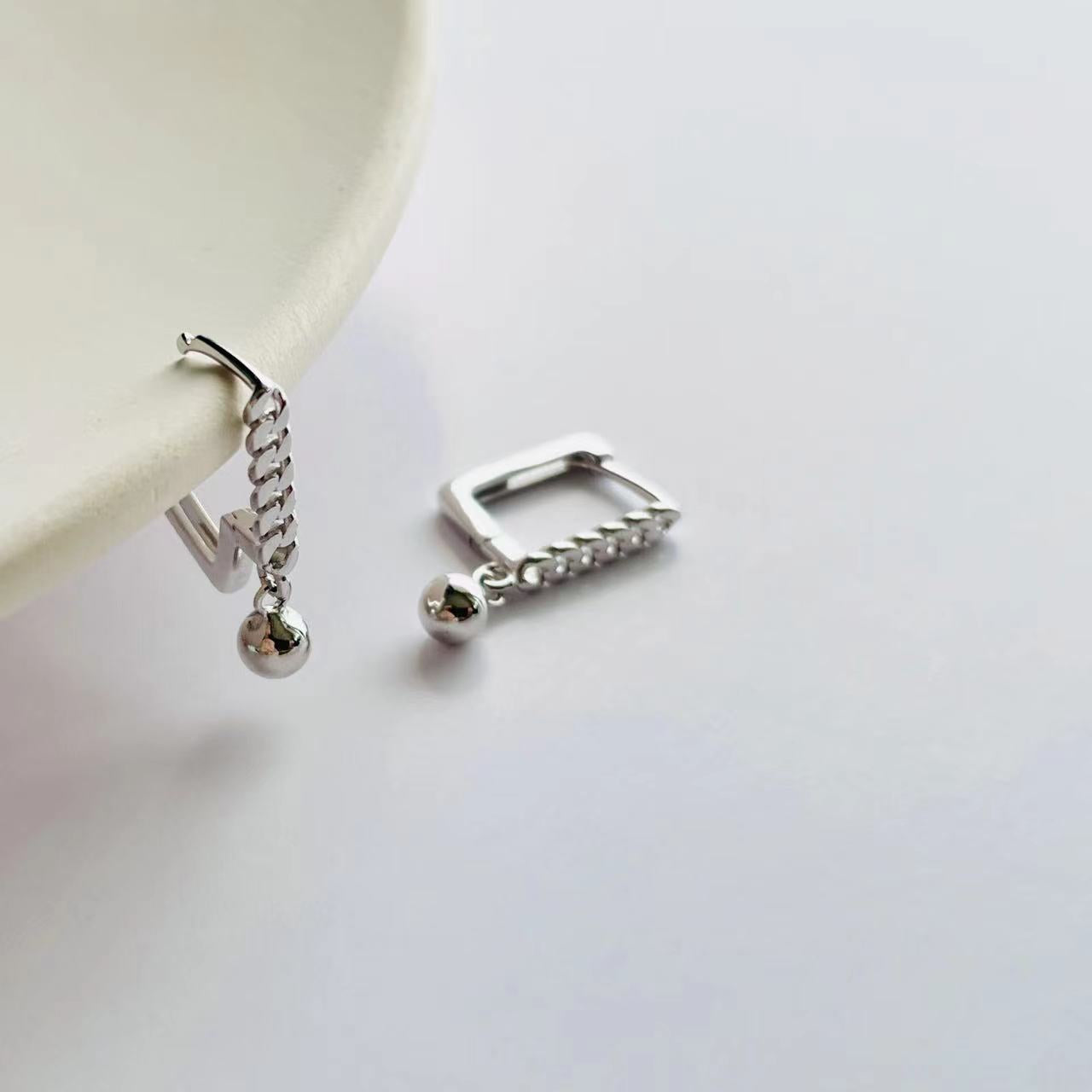 silver chain details earrings